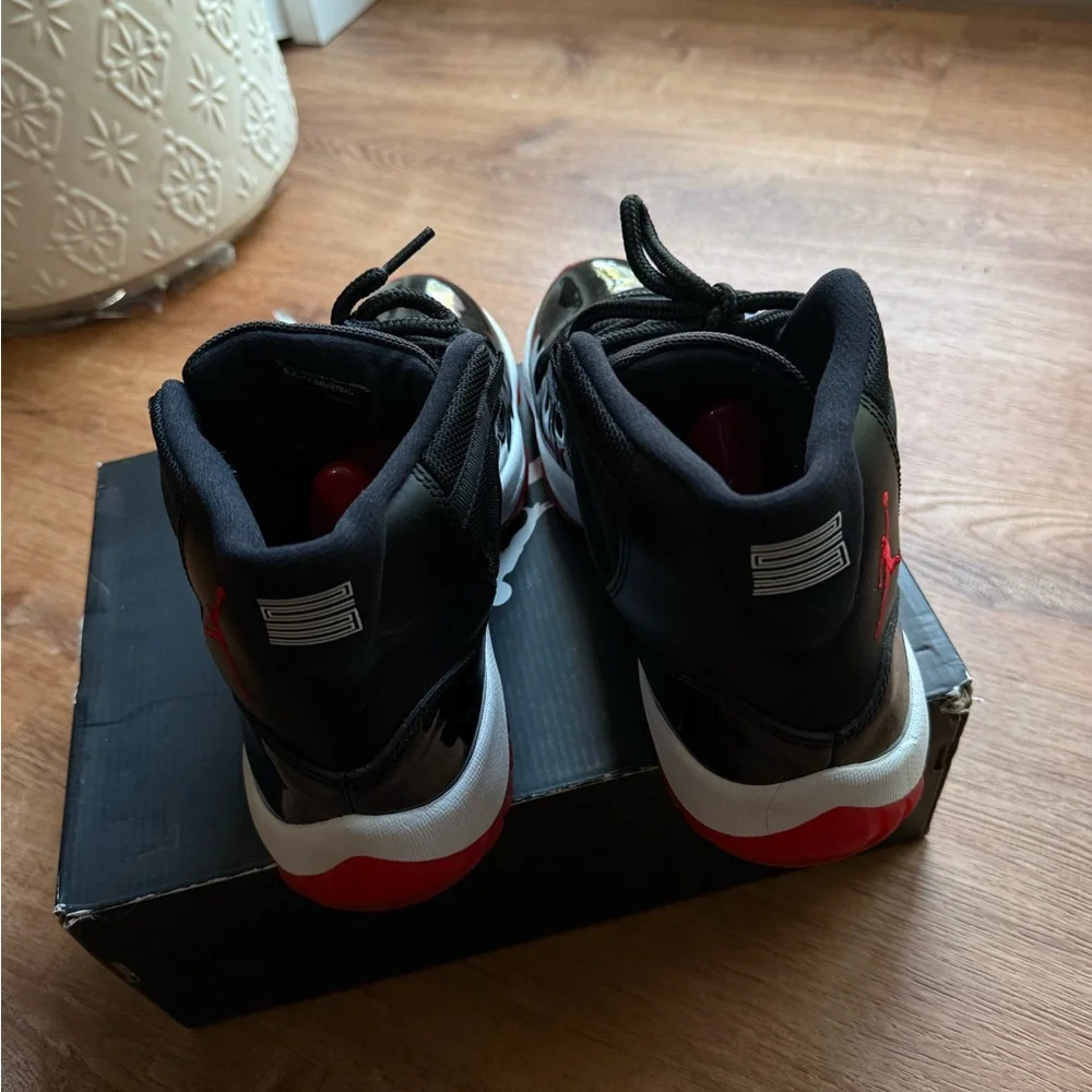 Air Jordan 11 Bred Black and Red High-Top Basketball Sneakers